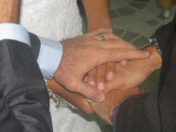 couple hands at the wedding