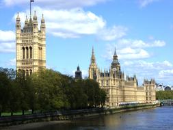 historic buildings on waterfront at summer, uk, england, London