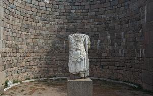 stone wall with sculpture