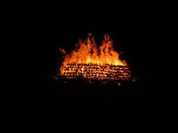 Fire-Walking Embers at night