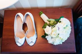 wedding bouquet with white shoes