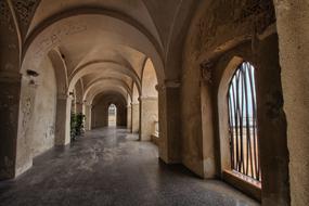 stone castle corridor with a window