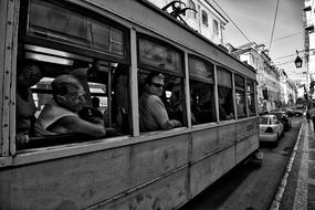 people watching from the streetcar