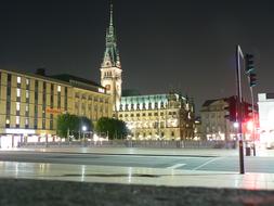 illuminated Town Hall on square at night, germany, Hamburg