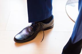 groom shoes close-up