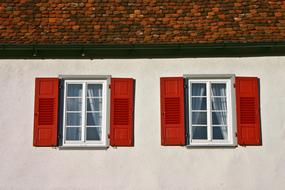 house with red shutters
