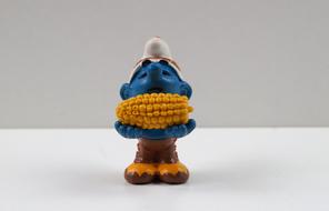 Smurf toy with corn