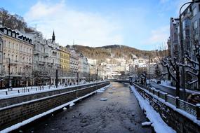 art nouveau villas on embankment of River at winter, czech republic, karlovy vary