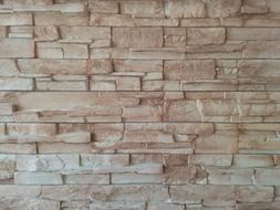 beige stone wall close up