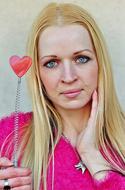 blonde girl with a heart