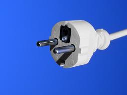 white plug and cable on a lilac background