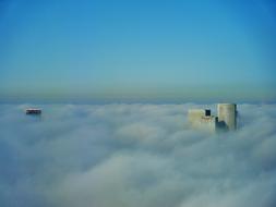 thick clouds over skyscrapers