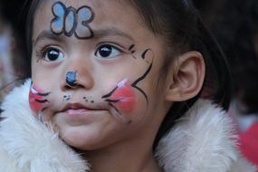 cute child Girl with painted face