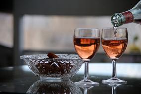 red wine in glasses on the table