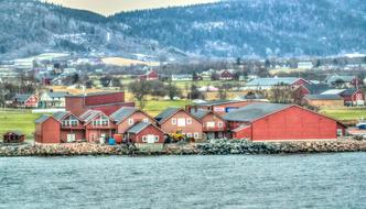 wooden cottages on the coast of Norway