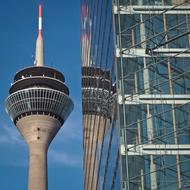 a television tower reflected in the glass facade of a building in Dusseldorf