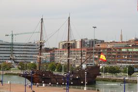 ancient sailboat in the harbor of the city of San Sebastian