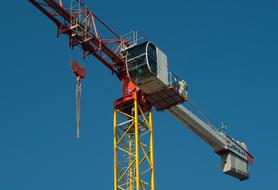 construction crane on blue sky background