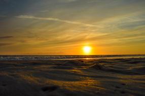 sunlight by the waves of the sea