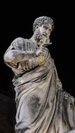 Roman sculpture of a philosopher in a museum