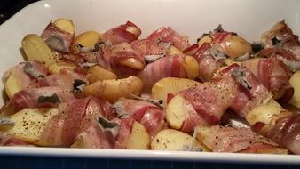 cooked meat and potatoes