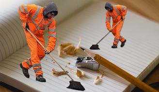 janitors clean up pencil shavings