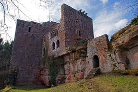 a crumbling old castle under the sky