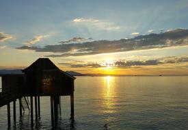 house by the sea in the sun