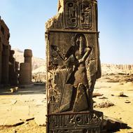 Egyptian symbols on a stone wall