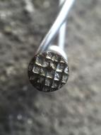 hammered nail in the wall