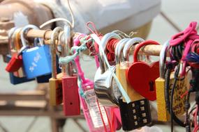 love locks on Brooklyn Bridge on a blurred background