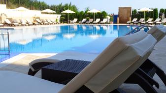 sun lounger by the resort pool