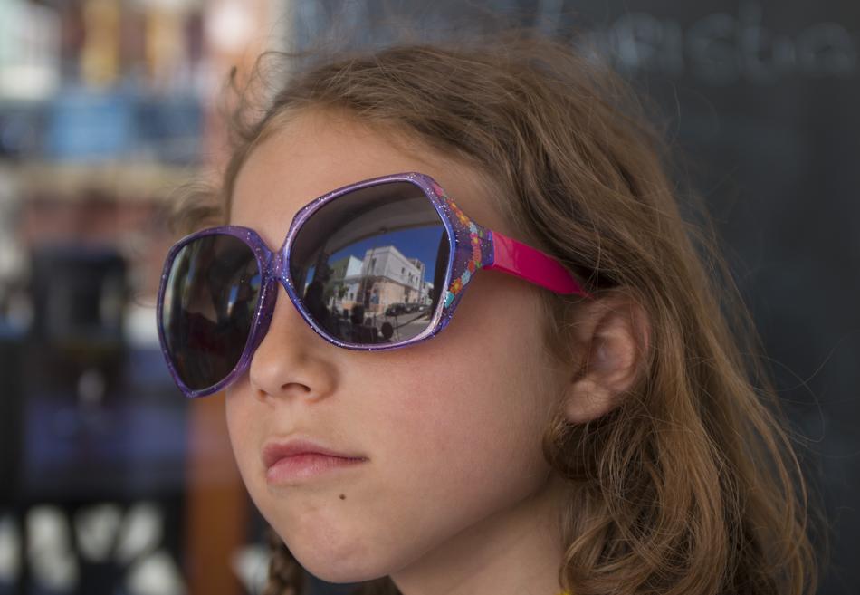 child wearing sunglasses