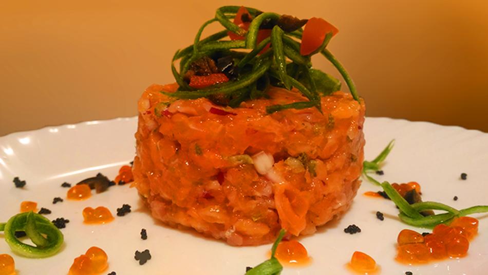 plate with salmon in sauce