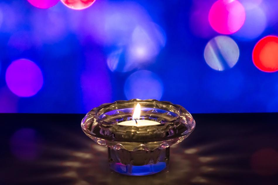 a candle burning in a cafe
