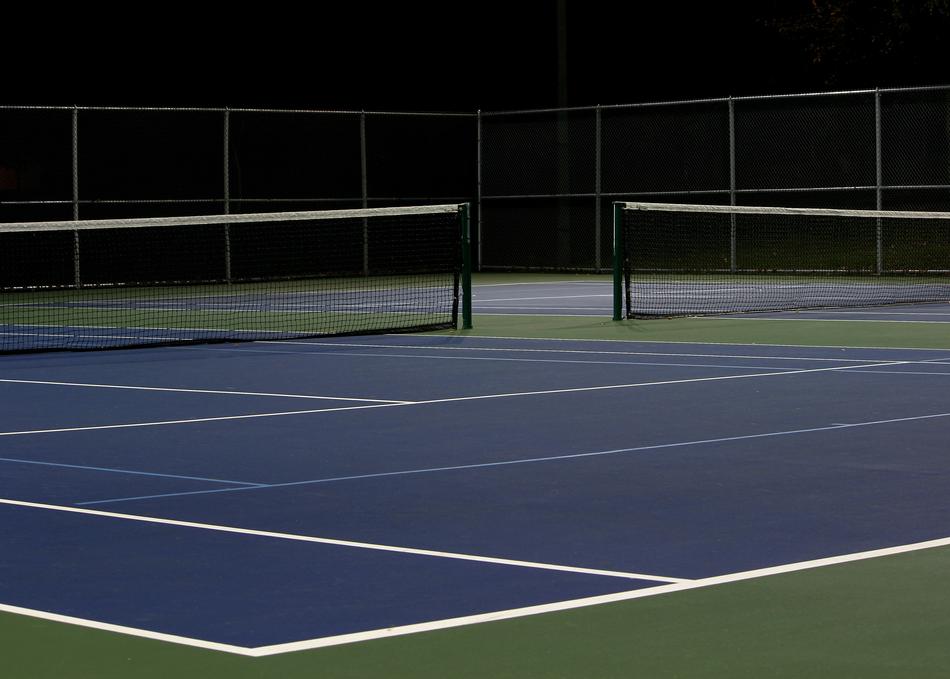 sports tennis court at night