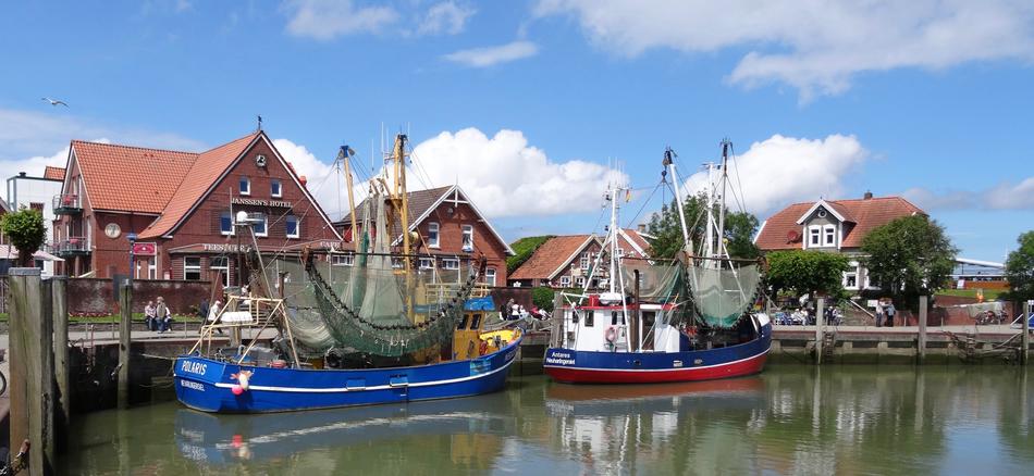 colored fishing boats on the harbor