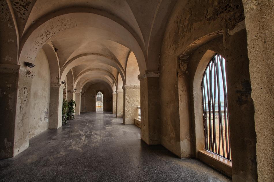 stone castle corridor with a window