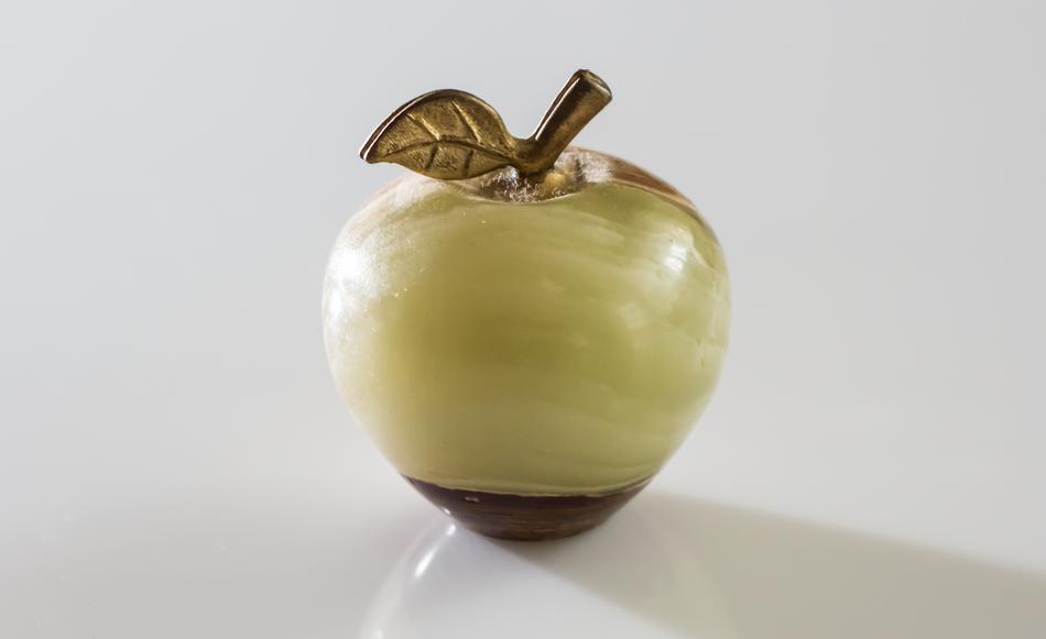 marble apple on a white background