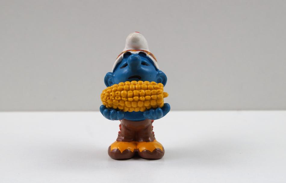 Smurf toy with corn