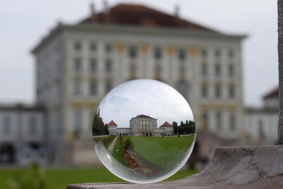 mirrored circle with a view of the building