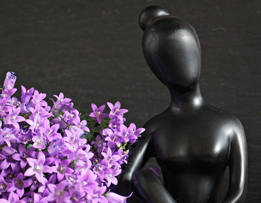 Woman Sculpture Figure and purple flowers