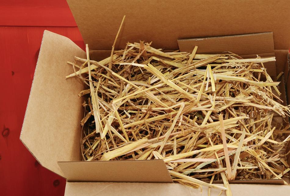dry hay in a cardboard box