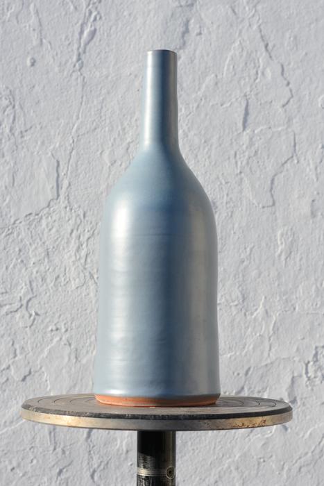 silver bottle on the table