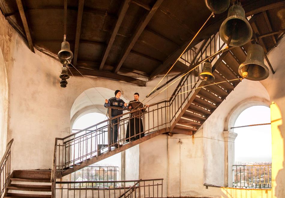 people in the bell tower, view inside
