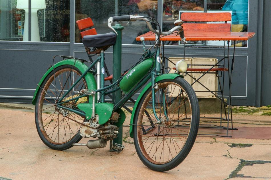 green bike in the parking lot