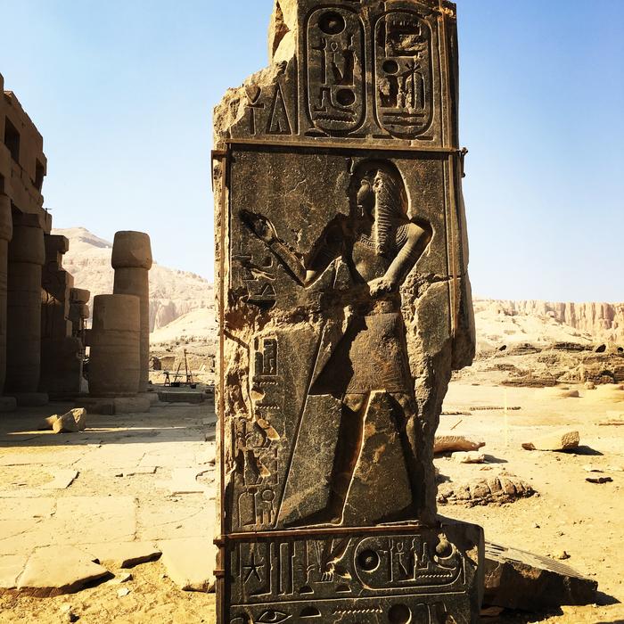 Egyptian symbols on a stone wall