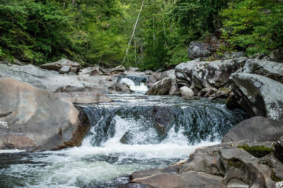 waterfall flowing down from the rocks