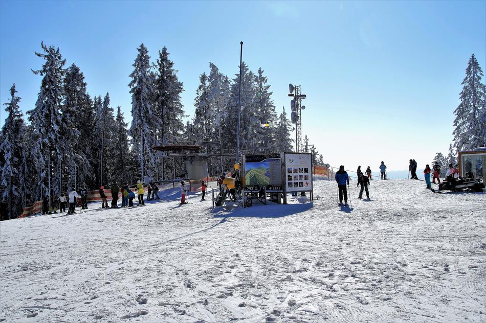 people walking on a snowy mountain