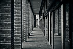 monochrome picture of brick columnar